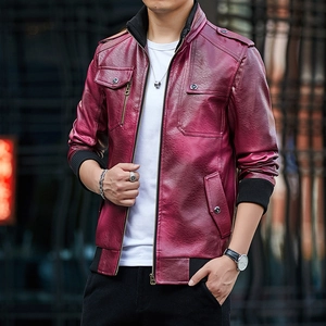 Detailed close-up of burgundy men's faux leather jacket with rib-knit cuffs and epaulettes