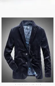 Detail view of navy blue corduroy blazer showing texture, notch lapel and printed lining