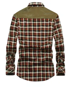 Detail view of plaid winter shirt back with olive corduroy shoulder patches and cuffs