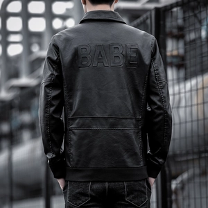Men's black faux leather jacket with BABE embossed lettering on back in urban street style
