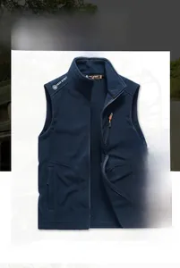 Detail of navy blue fleece vest featuring standing collar and zipped chest pocket