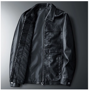 Detailed view of black PU leather motorcycle jacket with metal zippers and embroidered logo