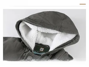 Detail of winter parka showing warm white sherpa fleece lining and windproof drawstring hood
