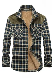 Detail view of winter plaid cotton shirt with warm fleece lining and chest pockets