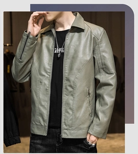 Close-up of slim-fit men's PU leather jacket with metal zipper details in grey-green color