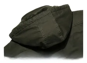 Detail view of the heavy-duty hooded jacket showing warm fleece lining and reinforced stitching