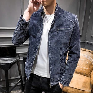Men's slim fit vintage denim jacket with metal zippers in a retro indoor setting