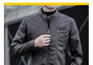 Détail d'une veste de motard ajustée pour homme avec col montant et fermetures éclair en métal