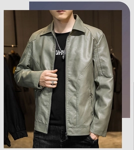 Detail view of the olive green PU leather jacket featuring a classic lapel and zipper
