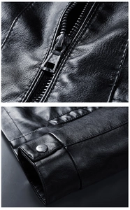 Detail of silver zipper and fashion metallic button on black faux leather moto jacket