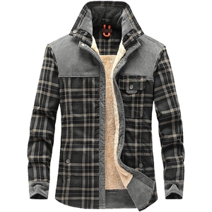 Detail view of winter plaid shirt jacket with warm sherpa lining and corduroy shoulder panels