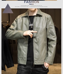 Detail view of grey-green PU leather jacket with quilted shoulder stitching and lapel