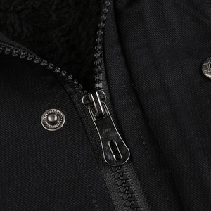 Detail view of durable black canvas jacket with metal zipper and warm fleece lining