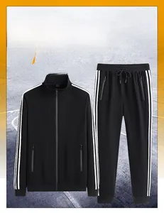 Detail of black men's track suit showing zip-up stand collar and white side stripes