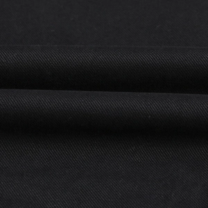 Close-up detail of durable black twill fabric with dense weaving for men's casual jackets