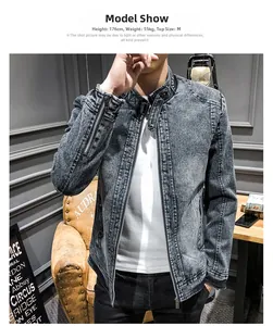 Close-up of retro dark grey washed denim jacket with metal zippers and stand collar