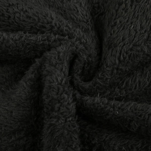 Close-up of premium black sherpa fleece lining showing dense curly texture for warmth
