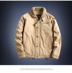 Detail of khaki military work jacket with lamb wool collar and A.R.M.Y. lettering