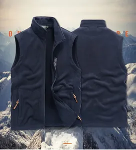 Macro detail of navy blue fleece vest featuring standing collar and side zipper pockets
