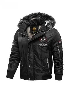 Detail of winter hooded jacket featuring a faux fur collar and embroidered chest badge
