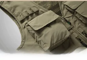 Detail view of reinforced sleeve binding and durable stitching on outdoor vest