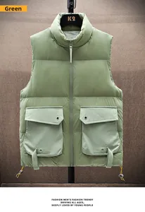 Detail view of the grass green quilted vest showing large utility cargo pockets with webbing