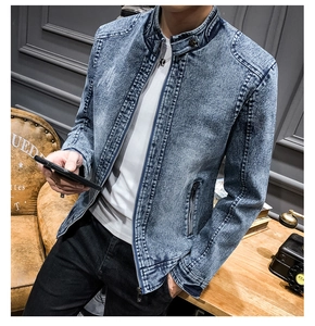 Detail view of men's slim fit vintage washed denim jacket with metal zipper and button collar