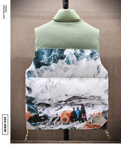 Detail of men's winter vest showing snow mountain and camping tent digital back print