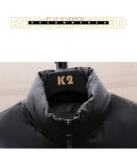 Close-up of black stand-up collar and metal zipper on high-quality men's padded vest