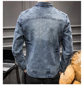 Detailed rear view of a slim fit washed blue denim jacket with contrast stitching details