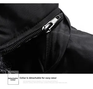 Detail of the high-quality metal zipper showing the detachable hood design for winter jacket