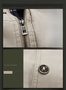 Macro detail of vintage metal zipper and engraved buttons on a khaki cotton jacket