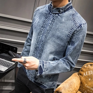 Men's vintage denim jacket in washed light blue featuring a stand collar and zip closure