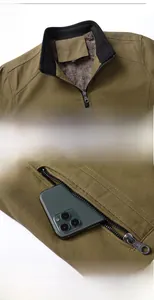 Detail of cargo jacket with thickened fleece lining and metal zipper phone pocket
