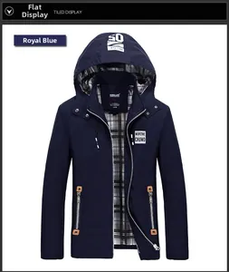 Close-up of royal blue hooded jacket featuring orange zipper accents and plaid lining