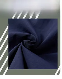 Gros plan sur la texture du tissu tissé bleu foncé avec une finition lisse
