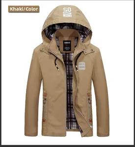Detail of khaki hooded jacket featuring classic plaid lining and a zip-up stand collar