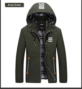 Detail of army green hooded jacket showing plaid lining and orange zipper accents