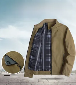 Detail of khaki jacket showing hidden zipper pocket and plaid lining with phone storage