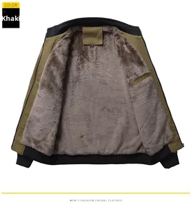 Detailed view of heavy khaki jacket with thick dark grey fleece lining and ribbed trims