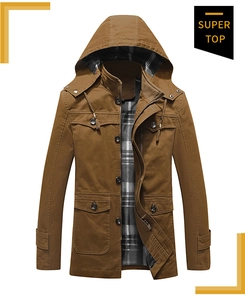 Detail of brown cotton jacket featuring multi-pockets and classic plaid lining