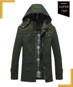Detail view of military green hooded jacket featuring checkered lining and utility pockets