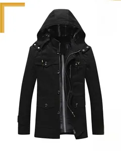 Detail of men's black hooded windbreaker with multi-pockets and striped lining