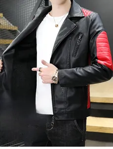 Detail of faux leather motorcycle jacket showing red quilted patches and fleece lining