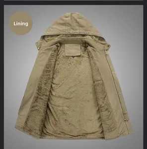 Detail view of khaki jacket with thick brown fleece lining and metal zipper closure
