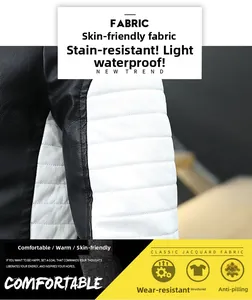 Detail of faux leather jacket shoulder with white quilted panels and black stitching