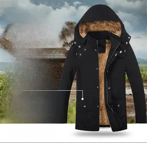 Detail view of winter outdoor jacket with warm brown plush lining and windproof hood