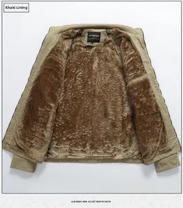 Detail of khaki men's winter jacket showing thick brown fleece lining and sturdy zipper