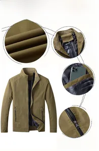 Detail view of khaki cotton jacket showing stand collar, plaid lining and inner pocket