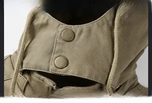 Detail of windproof stand collar with metal snaps and adjustable drawstring on a khaki jacket